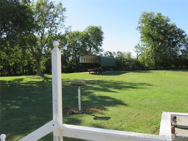 view of yard with a carport