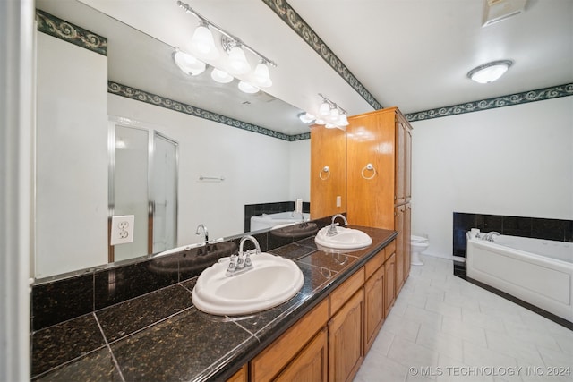 full bathroom featuring vanity, toilet, plus walk in shower, and tile patterned floors