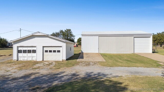 1202 SW 9th St, Wagoner, OK 74467 - view of detached garage
