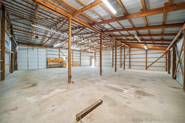 1202 SW 9th St, Wagoner, OK 74467 - garage featuring metal wall