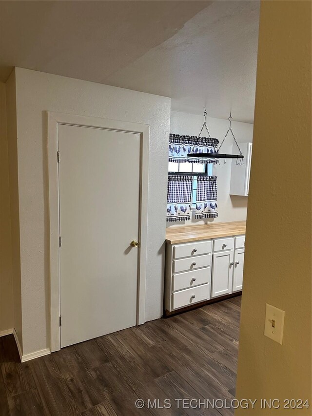 595 N 4340th Rd, Fort Towson, OK 74735 - hall featuring dark wood-style floors