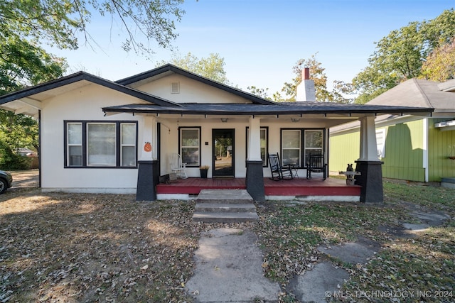 bungalow featuring covered porch