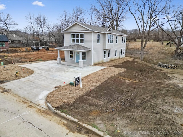 view of property with covered porch