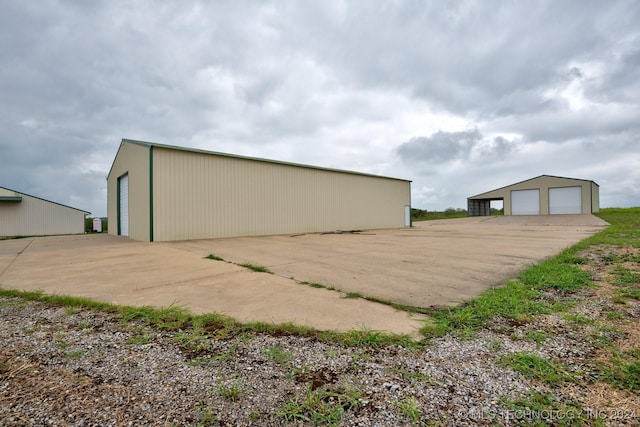 view of outbuilding with a garage