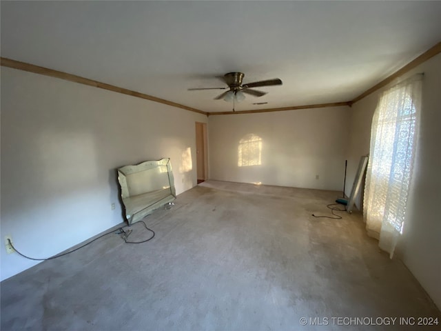 interior space featuring ceiling fan and ornamental molding