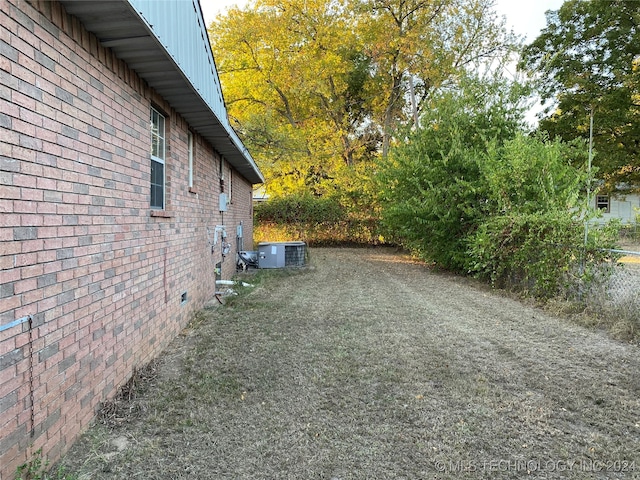 view of home's exterior featuring central AC unit