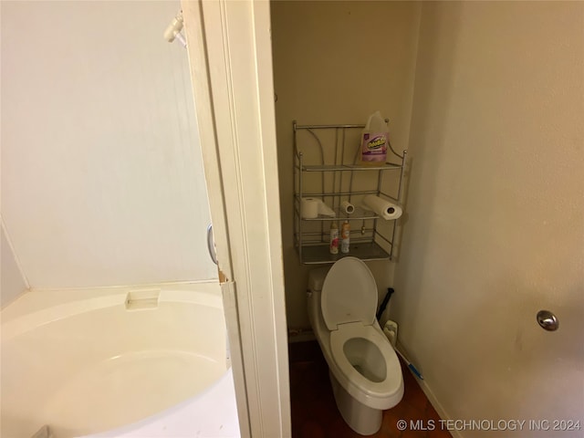 bathroom featuring toilet