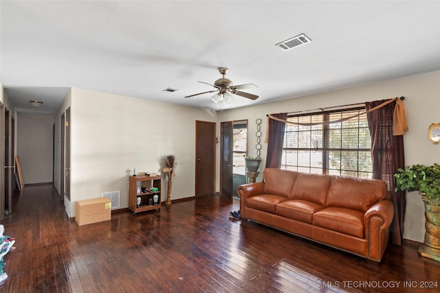 1421 S Hayes Ave, Wagoner, OK 74467 - living room with a ceiling fan, hardwood / wood-style floors, and baseboards