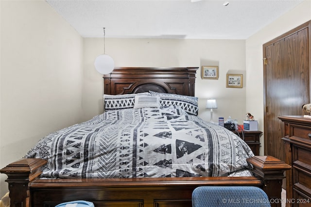 bedroom with a textured ceiling