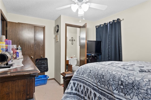 bedroom with light carpet, a textured ceiling, and ceiling fan