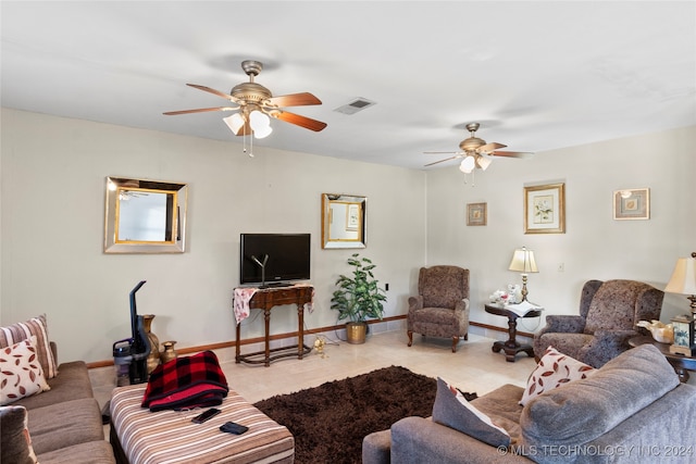 tiled living room with ceiling fan