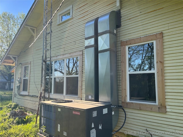 view of property exterior featuring cooling unit