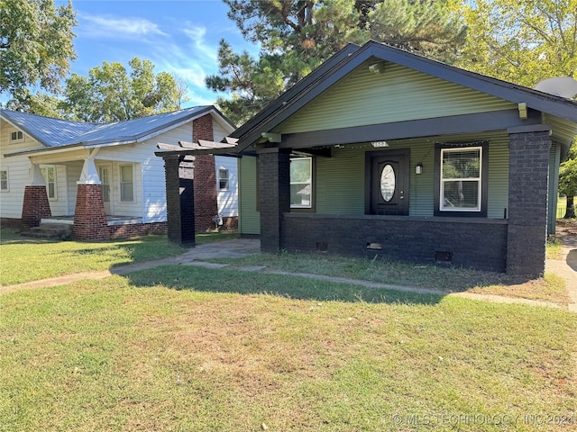 view of front of home with a front yard