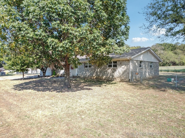 exterior space featuring a front lawn