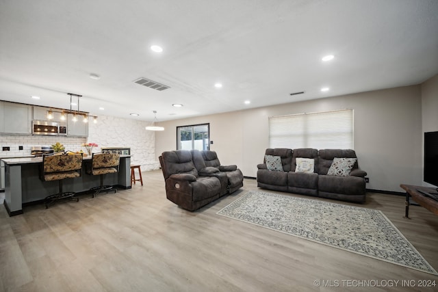 living room featuring light hardwood / wood-style floors