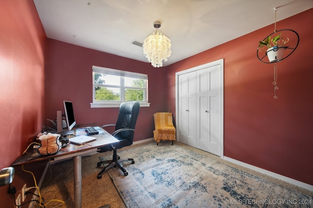 home office with an inviting chandelier