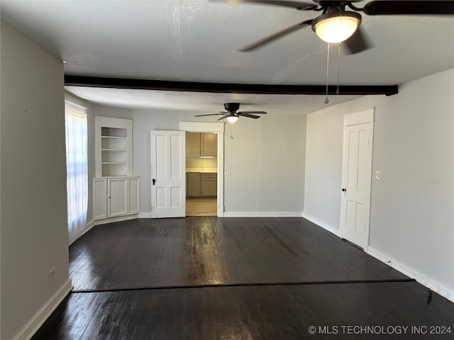 unfurnished living room featuring dark hardwood / wood-style floors, beamed ceiling, built in shelves, and ceiling fan