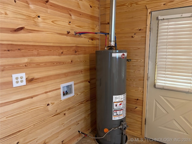 utility room with water heater