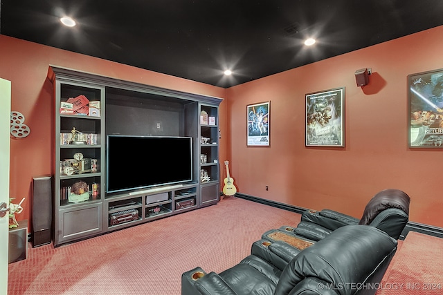 cinema room featuring carpet floors