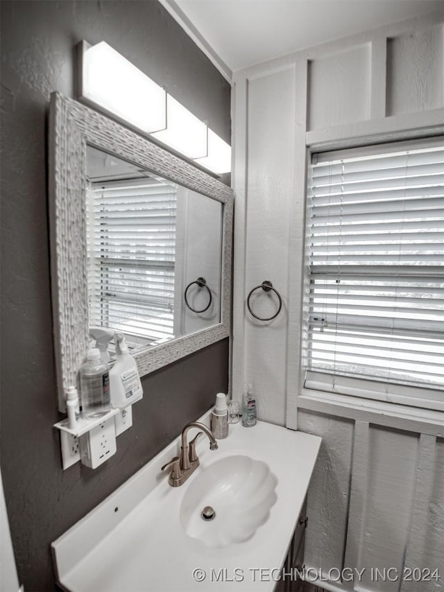 7386 Sooner Rd, Kingston, OK 73439 - bathroom featuring healthy amount of natural light and vanity