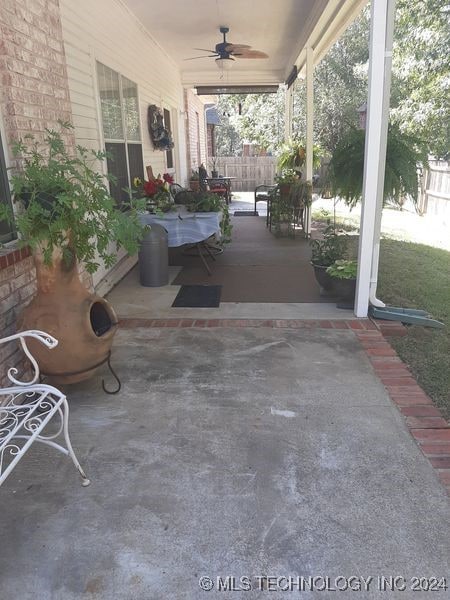 view of patio / terrace featuring ceiling fan