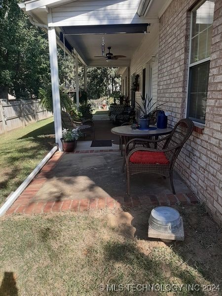 view of patio with ceiling fan