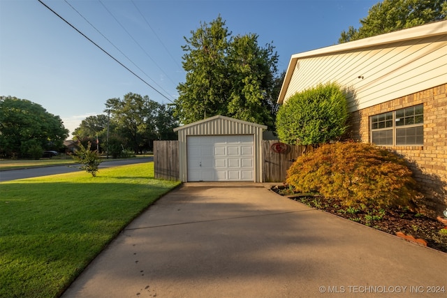 garage with a yard