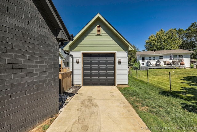 garage with a yard