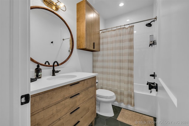 full bathroom featuring shower / tub combo, tile patterned flooring, vanity, and toilet