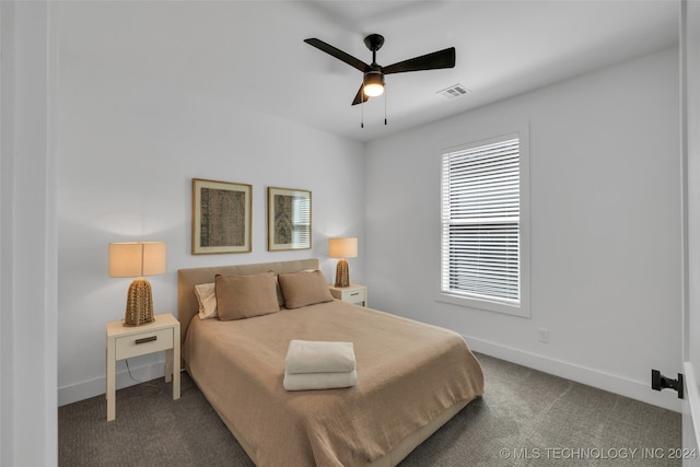 bedroom featuring ceiling fan and carpet flooring