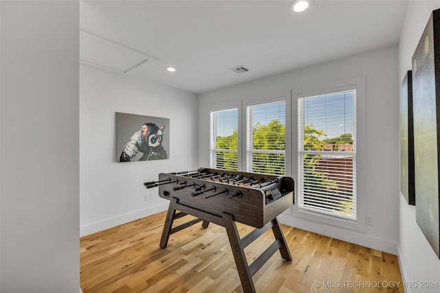 recreation room featuring light hardwood / wood-style flooring