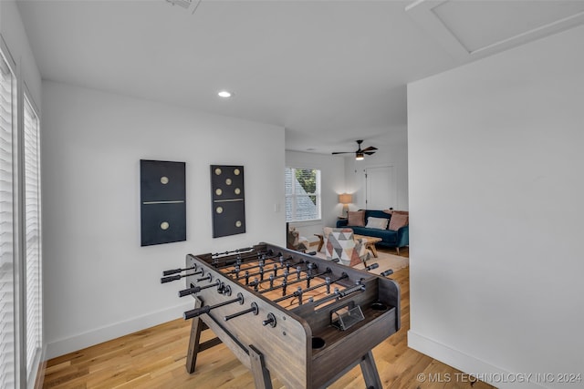 game room featuring hardwood / wood-style floors and ceiling fan