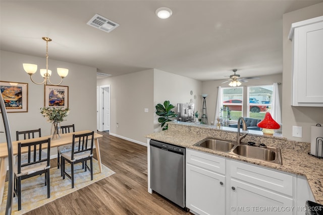 kitchen with dishwasher, sink, white cabinetry, light hardwood / wood-style flooring, and light stone countertops