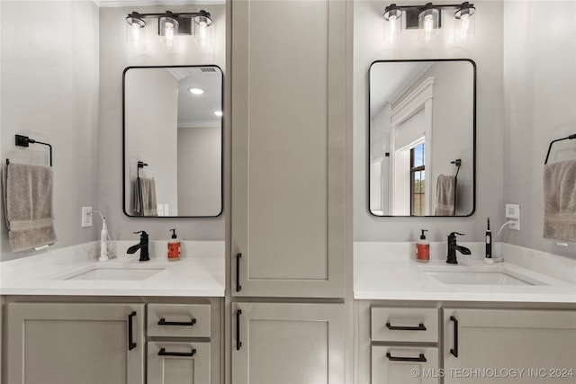 bathroom featuring vanity and crown molding