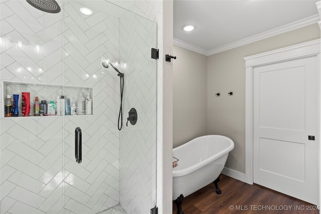 bathroom with independent shower and bath, wood-type flooring, and ornamental molding