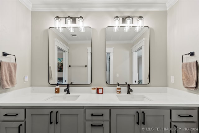 bathroom featuring vanity and crown molding