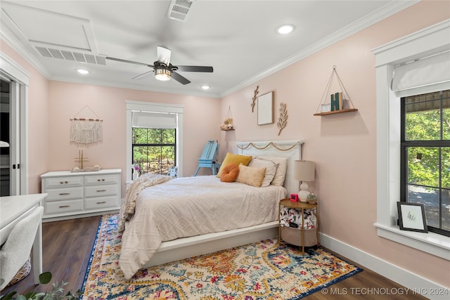 bedroom featuring ceiling fan, dark hardwood / wood-style floors, and crown molding