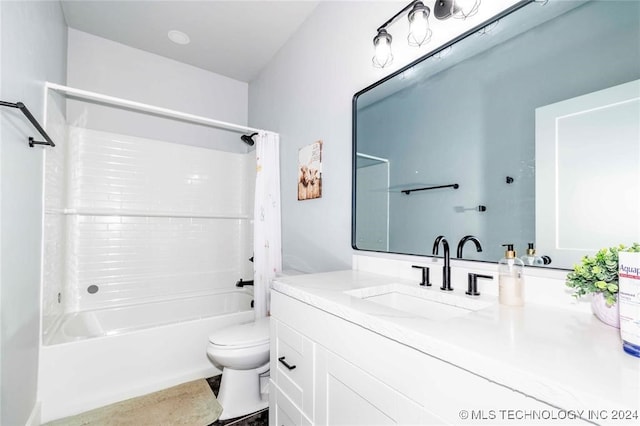 full bathroom featuring vanity, toilet, and shower / tub combo with curtain