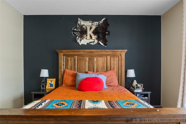 bedroom featuring a textured ceiling