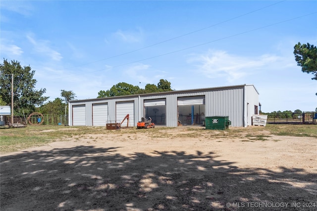 view of outbuilding featuring a garage