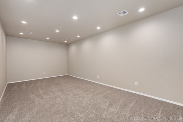 empty room with carpet flooring