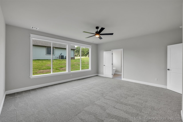 carpeted empty room with ceiling fan