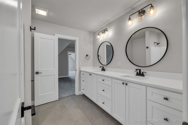 bathroom featuring vanity and tile patterned floors