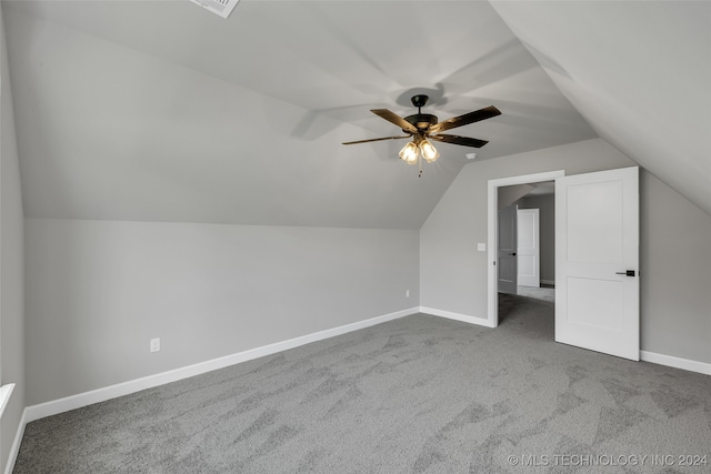 bonus room featuring lofted ceiling, ceiling fan, and carpet flooring