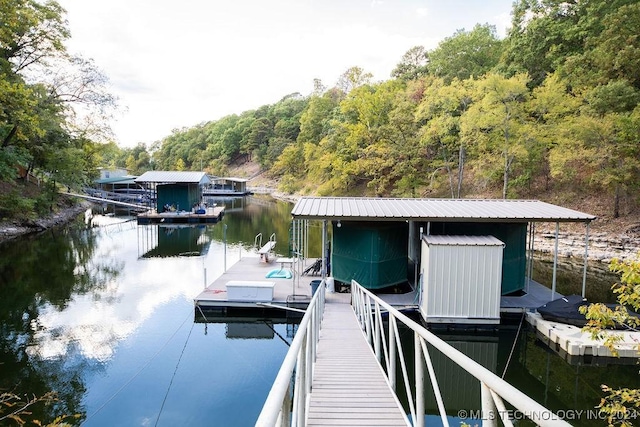 view of dock with a water view