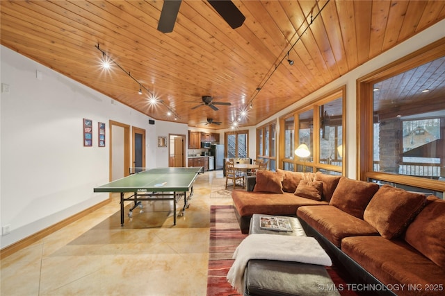 game room featuring light tile patterned floors, baseboards, wooden ceiling, ceiling fan, and track lighting