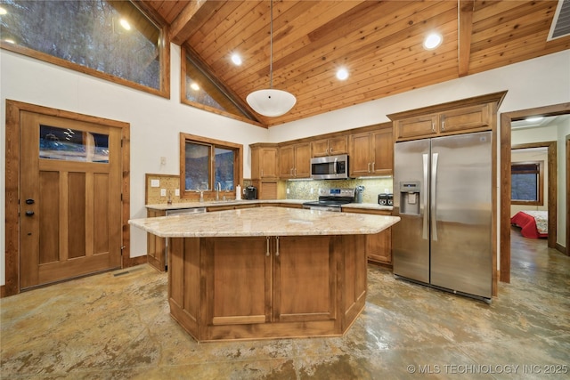 kitchen featuring tasteful backsplash, wood ceiling, appliances with stainless steel finishes, a center island, and high vaulted ceiling