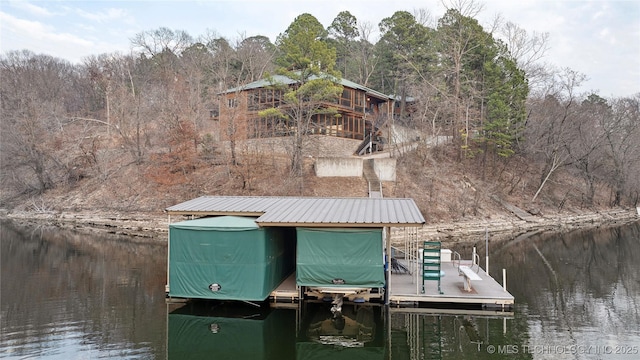 dock area with a water view