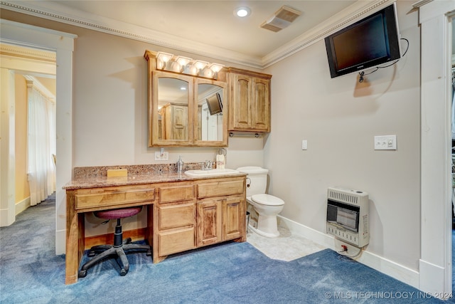 bathroom with vanity, ornamental molding, heating unit, and toilet