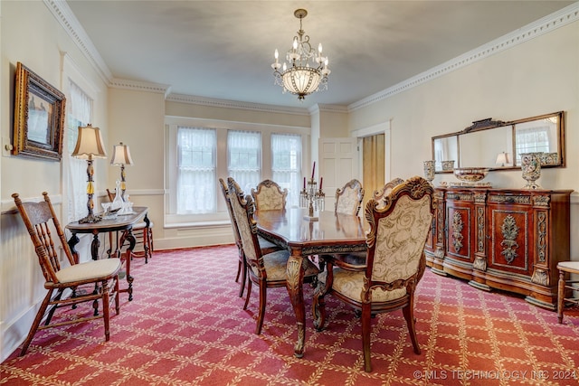 dining area with crown molding and a chandelier